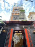 nhà hẻm ô tô 4x13m 4 lầu vị trí giáp q. tân bình