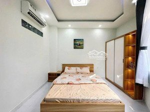 bán nhà 1trệt 2 lầu tại mặt tiền quốc lô 55 thị trấn phước bửu , cách chợ bà tô 100m , giá 5.8tỷ tl