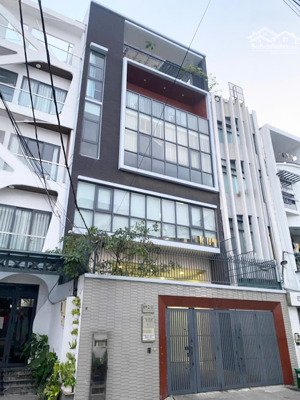 cho thuê tòa nhà ốp kính đường nguyễn gia trí (d2) - ngang 8m