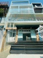 tòa nhà cho thuê mt nguyễn trọng tuyển, p1. dt: 10x20m. 1 hầm 5 tầng. giá 90tr/tháng.