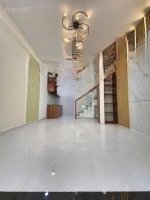 nhà 1 trệt 1 lửng 1 lầu 495tr mặt tiền nhựa bán gấp