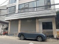 nhà mặt tiền 10m có chỗ để xe, trục dân cư đông đúc, gần chợ, trường
