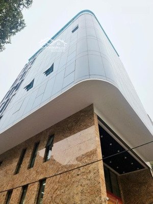 bán nhà nguyễn xiển ,tòa nhà kdvp đỉnh cao,10 tầng thang máy,2 mặt tiền 1 mặt hồ, dòng tiền cao