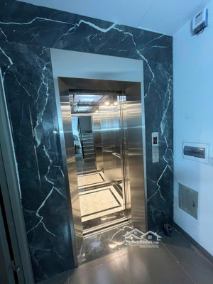 bán nhà thang máy, 7 tầng, 72m², phố nguyễn chánh, ngõ ô tô tránh, ngay big c, dòng tiền ổn định