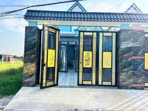 bán căn nhà 1 trệt 1 lầu mới xây shr, đối diện cổng kdc tân đức dtsd 150m2 shr full thổ, giá 1tỷ399