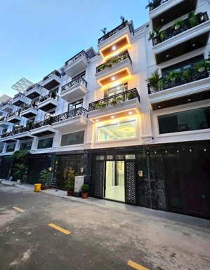 nhà 1 trệt 1 lửng 3 lầu khu đồng bộ vip 100 căn