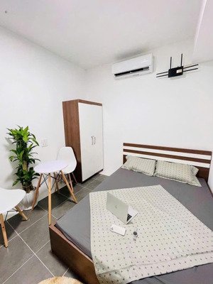 bán tòa chdv phố giang văn minh 22 phòng, vf3 đỗ cửa, doanh thu 100tr/tháng, thang máy, 90m2