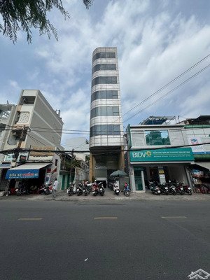 bán gấp toà nhà 3 mt số 82-84 đường lê quang định binh thạnh dt: 6.5x 21m hầm 8 tầng giá 67 tỷ