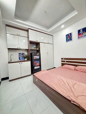bán tòa chdv phố trường chinh 22 phòng khép kín, dt 100tr/th, ngõ ba gác, cách ô tô 20m, 87m2