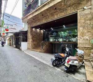bán nhà mặt phố nguyên hồng mặt tiền 6.8m vỉa hè 8 tầng thang máy trên ở, dưới kinh doanh