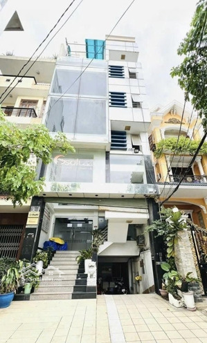 kẹt nợ bán toà nhà ngay mt 569 nguyễn kiệm, q.phú nhuân - 6x19 hầm 6 tầng - 20ty.