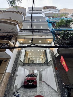 bán siểu phẩm nhà đẹp trịnh công sơn, 55m2 x 7t thang máy, gara oto, view hồ, 10m ra phố