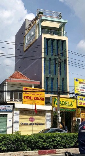 bán nhà mặt tiền kinh doanh có sẵn thu nhập 45triệu / tháng , vị trí đẹp đối diện siêu thị go