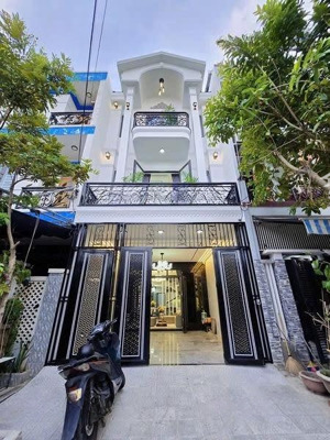 bán nhà siêu mới út tịch, p4, q. tb, hẻm xe hơi, 67,2m2, 3 tỷ 3, hđ thuê 21tr/th, shr sạch đẹp.