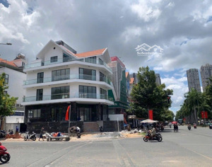 cho thuê toà nhà văn phòng góc 2 mặt tiền kdc him lam - q7 lh 