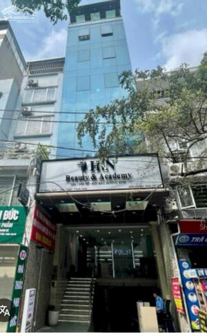 BÁN TOÀ NHÀ MẶT PHỐ NGUYÊN HỒNG, QUẬN ĐỐNG ĐA, LÔ GÓC 100M2, 9 TẦNG, 105 TỶ.