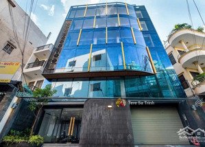 giảm sốc !!! toà nhà building phổ quang - phú nhuận(15 x 15m)hầm 4 lầu hđt: 130 tr/th giá: 49,9 tỷ