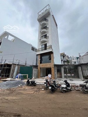 siêu phẩm nhà 7 tầng thang máy - full nội thất - đường 13.5m tránh container long biên