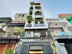 nhà cạnh cv làng hoa - đường thông 8 m - 6 tầng có thang máy - vừa ở vừa kinh doanh