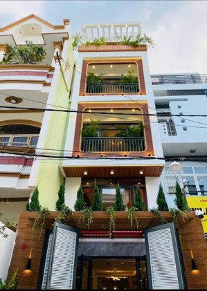cho thuê siêu phẩm hxt thông ô tô ngủ trong nhà(4x17m)1 lửng 3lầu 4pn.6wc full nt 331/ phan huy ich