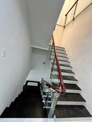 bán nhà lầu mặt tiền đường nhựa - kdc hùng vương - tp phan thiết