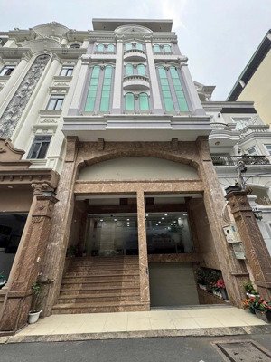 bán tòa nhà mặt tiền trần xuân soạn hầm 6 tầng - quận 7 - dt 6,2 x 28m - hdt 160tr/th - bán 45 tỷ