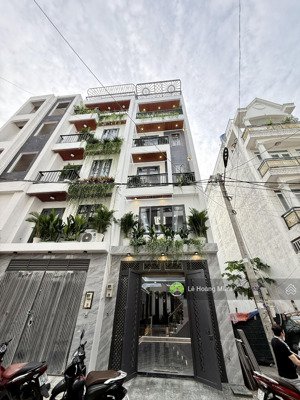 nhà phố 1 lửng 3 lầu full nội thất hẻm 8m thông nguyễn ảnh thủ