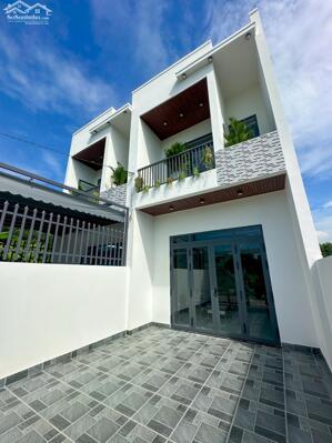 Bán nhà lầu đẹp y hình xã Bình Lợi Vĩnh Cửu