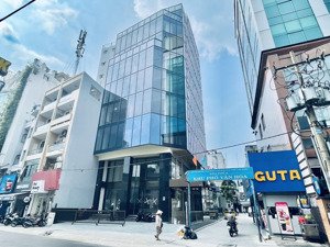 cho thuê tòa nhà góc 2mt 84 huỳnh văn bánh 15 x 25m 2 hầm 11 tầng - giá 950 triệu/tháng