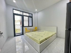 phòng studio ban công thoáng- thang máy- full tiện nghi đường trần văn đang, q3 ngay bờ kè giáp q1
