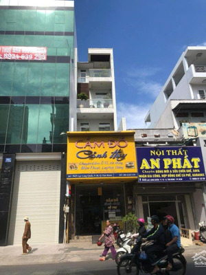 bán nhà mặt tiền lạc long quân, p.10, q. tân bình giá giảm sâu, có thang máy