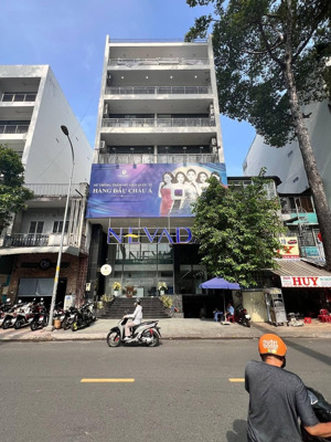 tòa nhà 265-267 trần bình trọng, p4, q5 - dt 10x20m. hầm, 1 trệt, 1 lửng, 5 lầu, st thang máy