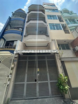 bán nhà 6 tầng mặt tiền huyền quang, quận 1 thông ra thạch thị thanh - trần quang khải