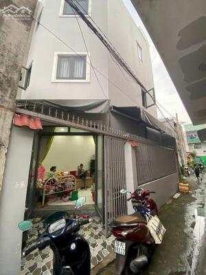 Nhà đẹp 1 trệt 2 lầu đường đông hưng thuận 09 q12