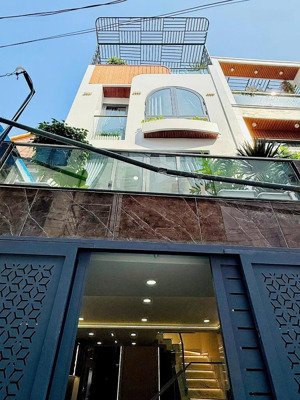bán nhà đẹp đường út tịch q. tân bình, 1 trệt 1 lầu, 3 phòng ngủ, giá 3 tỷ 470, sổ hồng riêng
