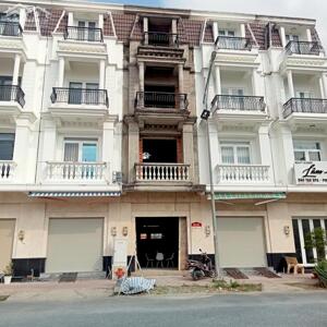 NHÀ MẶT TIỀN 4 TẦNG ĐỐI DIỆN CHỢ BÁCH HÓA BÌNH MINH.