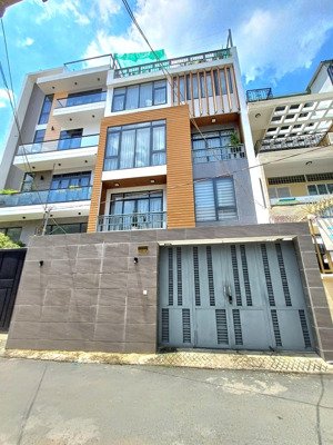 mt nguyễn cửu vân giáp quận 1 dt: 7 x 25m 4 tầng sàn suốt mới sạch