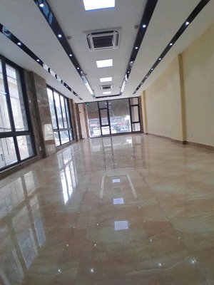 cho thuê toà nhà 9 tầng lô góc mặt phố khuất duy tiến mặt tiền 30m, dt 100m2 x 9 tầng, pccc đầy đủ
