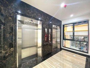 cho thuê nhà lô góc láng hạ - nguyên hồng- 7 tầng 200m thang máy - giá thuê 60tr/th