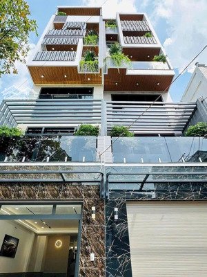 nhà 5 lầu, mặt tiền đường số 12, có thang máy, gần công viên làng hoa
