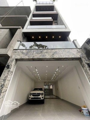 bán nhà mặt phố trạm,7 tầng,thang máy,gara 3 ô tô,100m_mt5.3m,kinh doanh đa dạng, 26.5ty