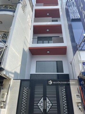 mặt tiền dương quảng hàm ( 4,3*30m ) thang máy - trống suốt - mới xây - p5 -gv - khu vip