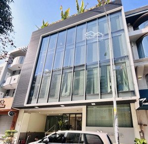 tòa nhà đường nhánh khu trần não 12x20m hầm trệt 4 lầu cho thuê