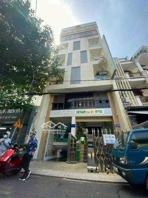 xuất ngoại, bán tòa nhà vp đường hoàng văn thụ, p8, phú nhuận. dt 8x22. kc 7 tầng.sẵn hđt.gía 38 tỷ