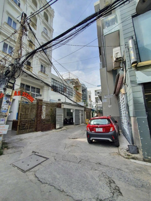 hẻm ô tô ngủ trong nhà, sát mặt tiền phan đăng lưu, 5 tầng st, dt: 4x14m, giá chỉ 13,3 tỷ