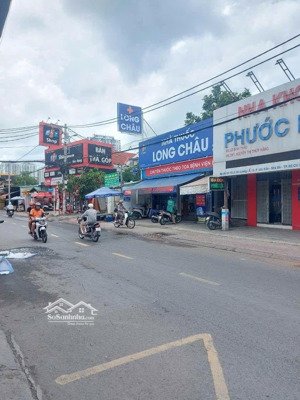 nhà bè - mặt tiền vip lê văn lương - 256m2 - ngang lớn 7m nở hậu đẹp. dòng tiền 50tr/tháng.