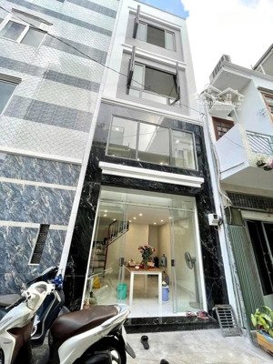 quận 10 nhà đẹp 5 tầng hxh quay đầu 72m2