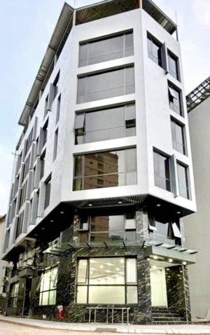 bán toà văn phòng 8 tầng lô góc, mặt phố khuất duy tiên thanh xuân dt 145m mt 20m kd 160tr/tháng.