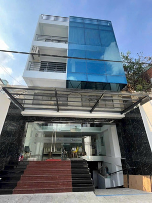 tòa nhà đường lê đức thọ 8x22m hầm trệt 4 lầu cho thuê