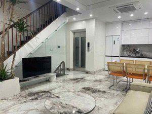 hoa bằng - cầu giấy - 6 tầng thang máy - kinh doanh - ngõ thông - mt 5m - sổ đỏ đẹp